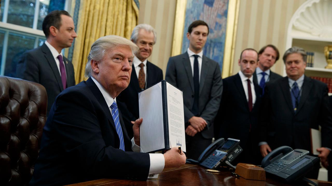 President Trump signs 3 executive orders, withdraws US from TPP