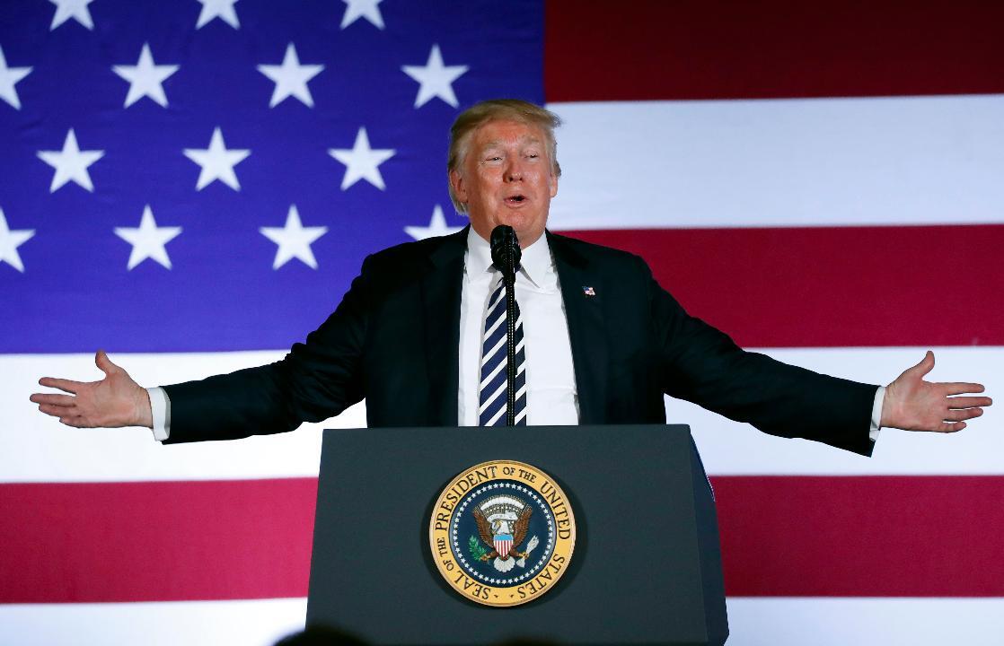 Liberal filmmaker Michael Moore calls tax cut ‘an act of terror’