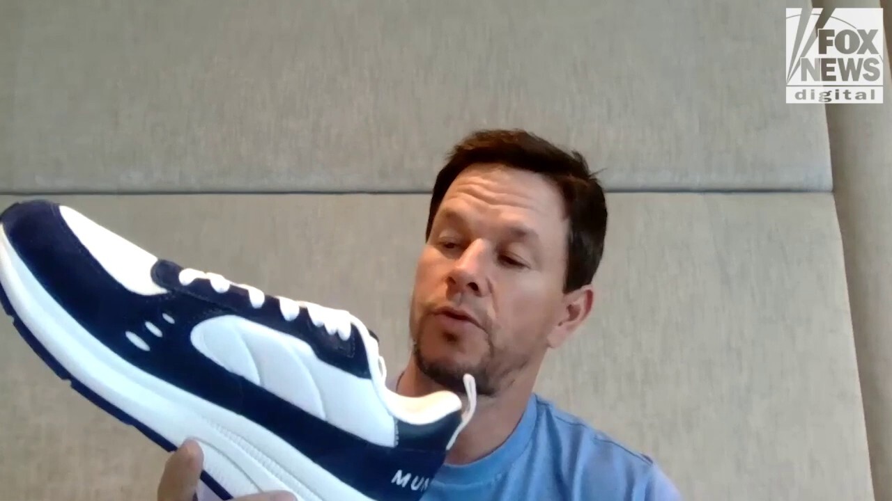 Mark Wahlberg tells FOX Business that his shoes are assembled "for the most part" in the same place designer shoes are made.