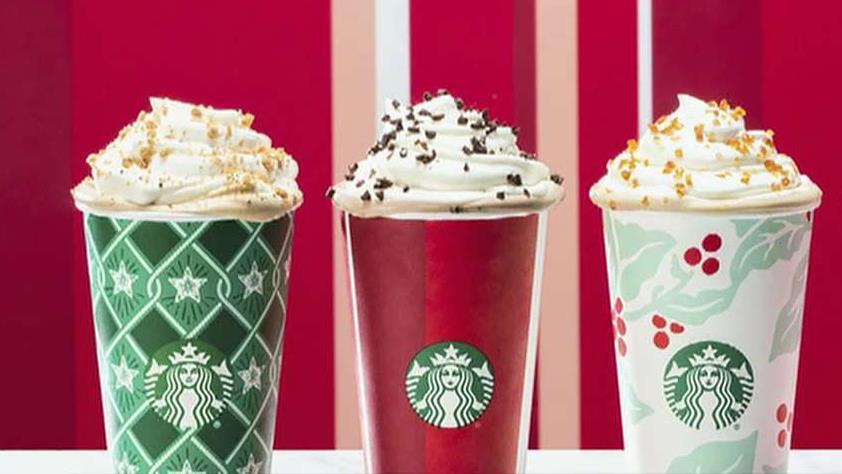 Starbucks unveils new holiday cup designs