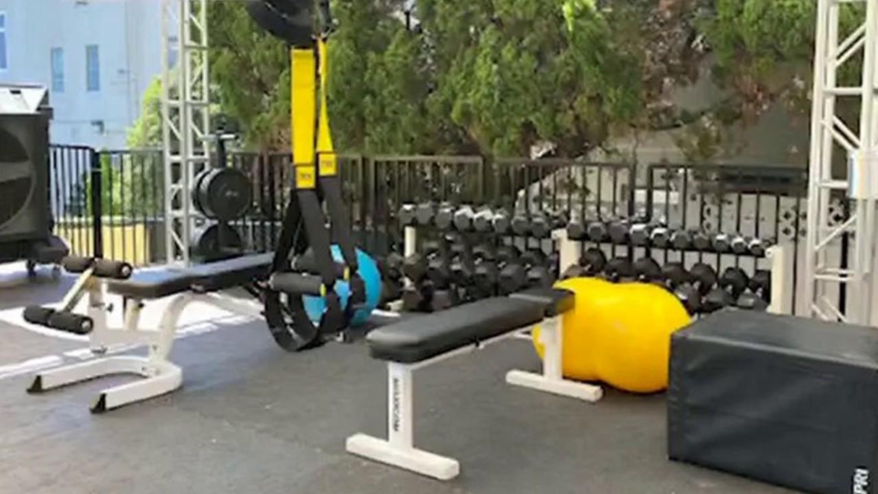 California gym adapts to coronavirus, moves equipment outdoors 