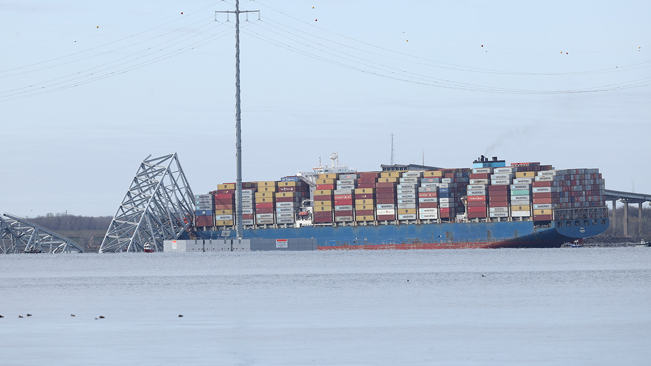 The massive bridge collapsed overnight when a cargo ship lost power and rammed into it.