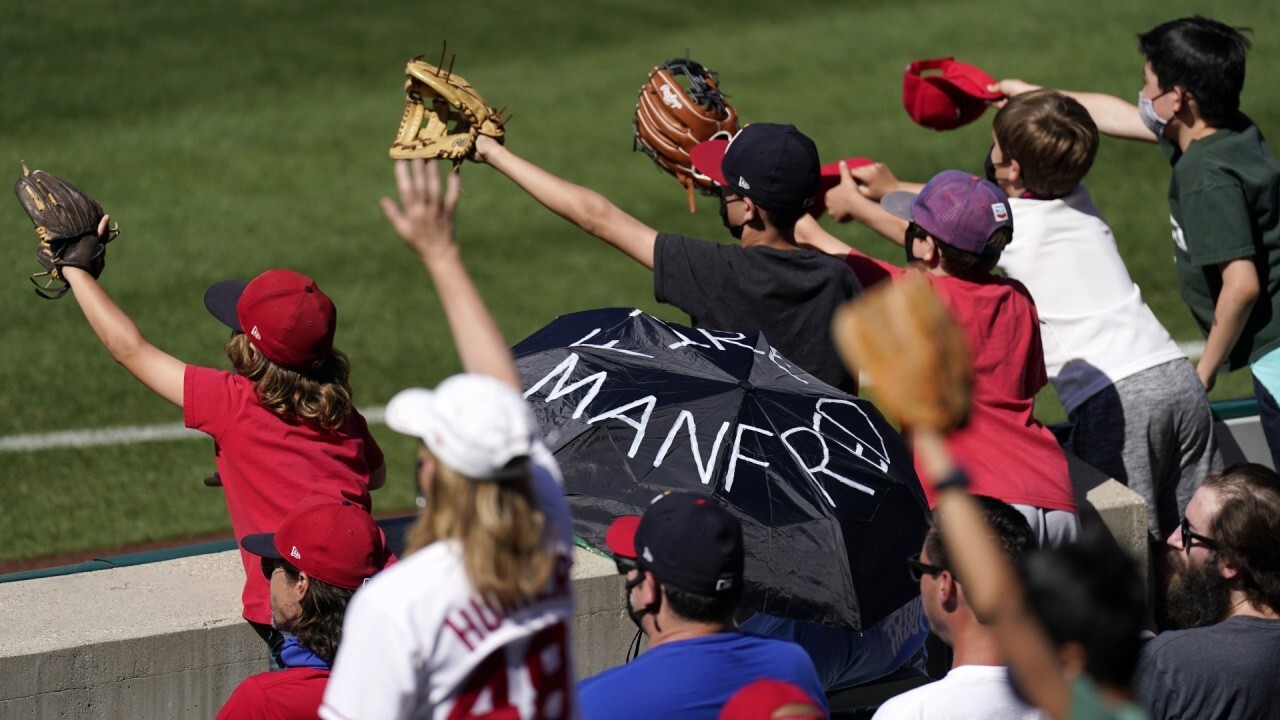 MLB commissioner Manfred faced pressure to endorse progressive voting laws: Sources