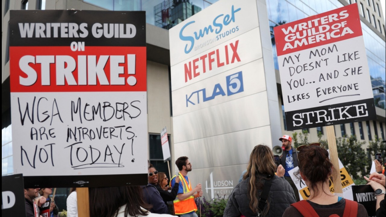 Hollywood writers' strike heats up as screen actors join the picket line