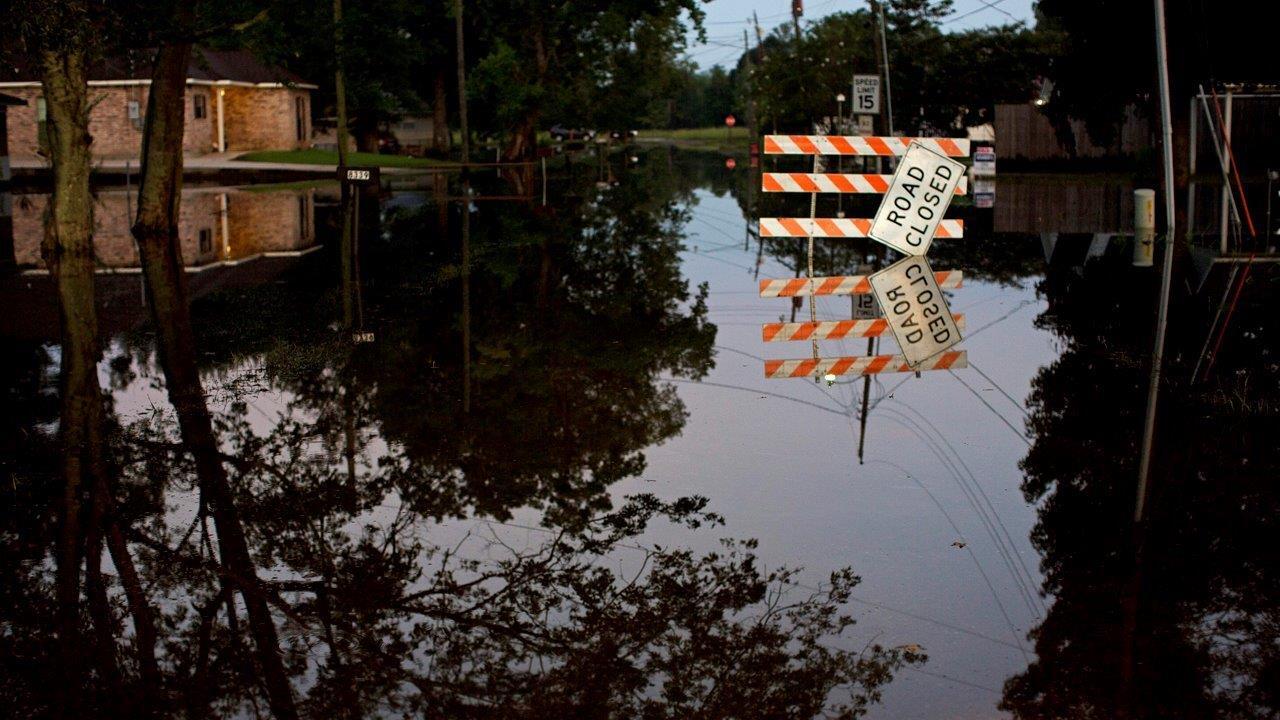 Is Hillary Clinton making a mistake delaying a visit to Louisiana flood zone?