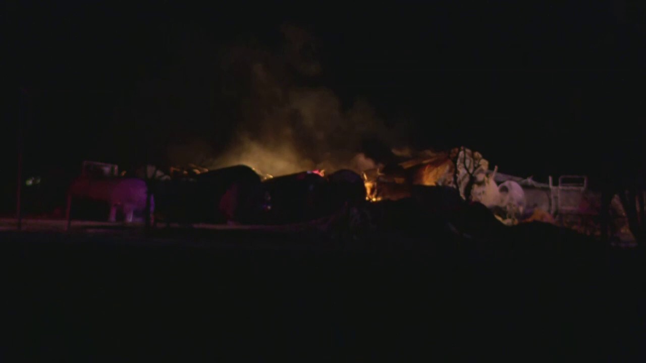 A BNSF Railway train carrying ethanol and other products derailed and caught fire early Thursday, and some in Raymond, Minnesota, were forced to evacuate. (WCCO)