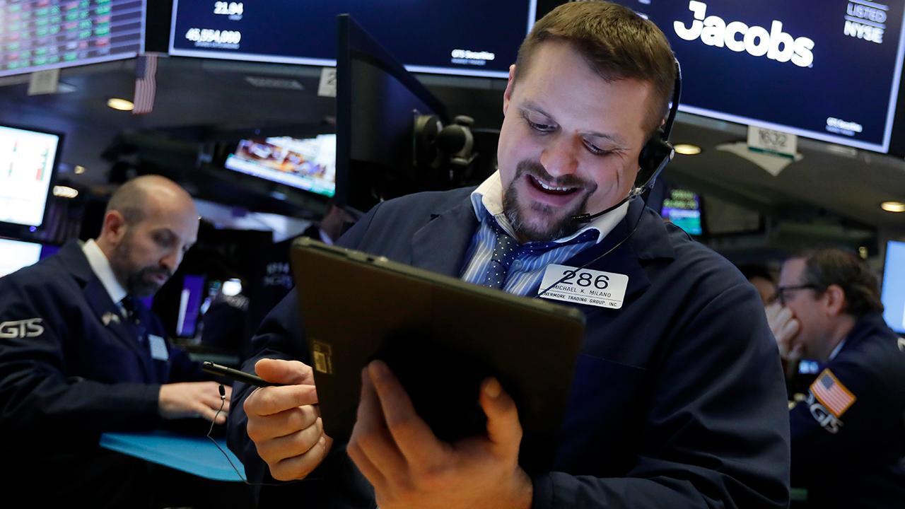 Stocks climb to record highs following Trump's acquittal 