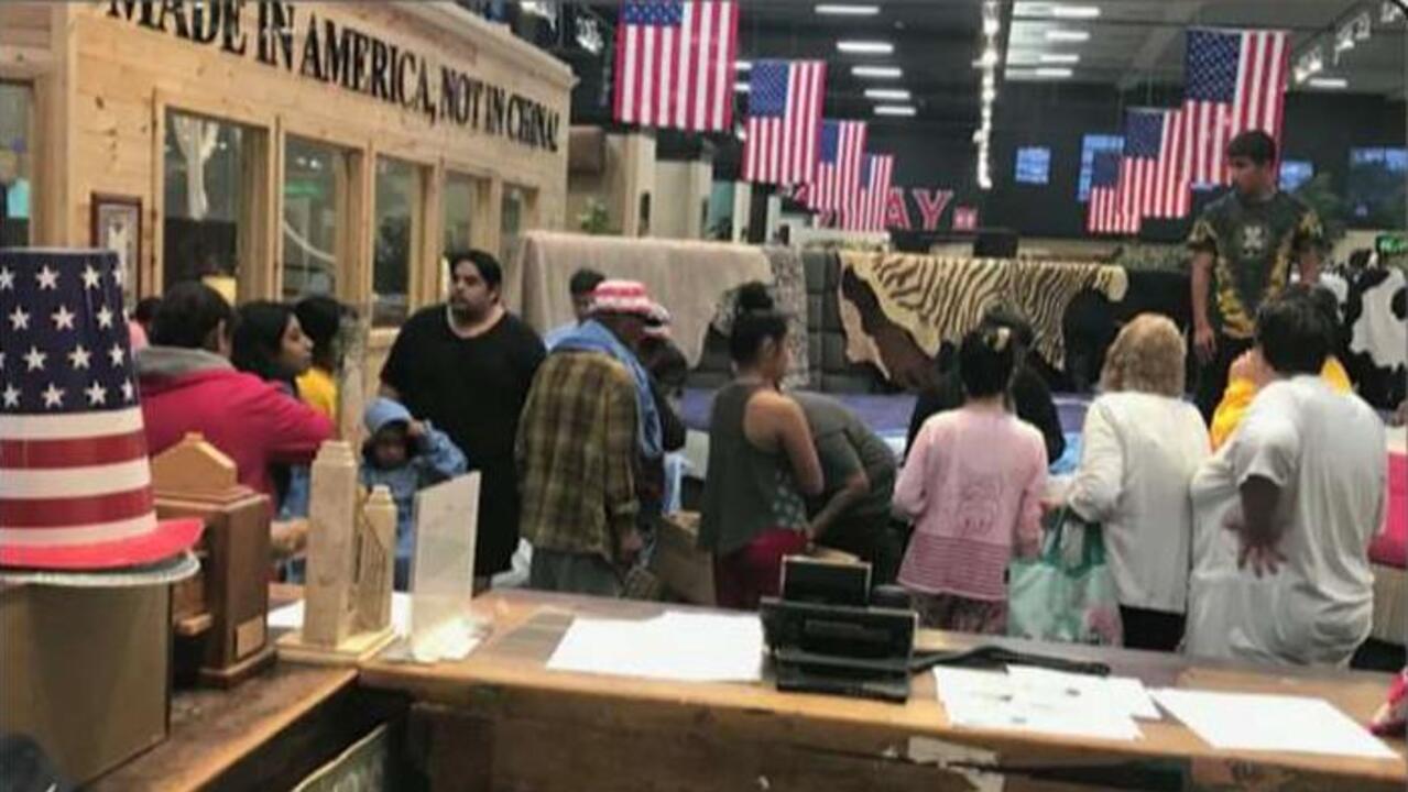 Harvey evacuees given shelter by furniture store owner