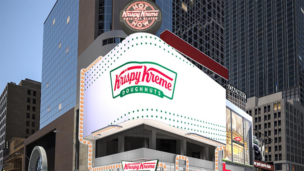 The Dow sees slight gains; Krispy Kreme gives away $1 dozen glazed donuts