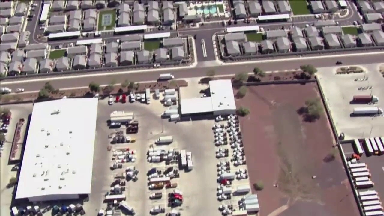 Two Amazon Air Prime delivery drones collided into a crane in a commercial area Wednesday in Tolleson, Arizona. (KSAZ)