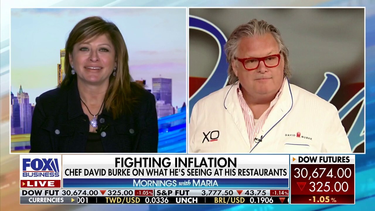 Celebrity chef David Burke argues people are 'coming in and spending' despite rising prices.