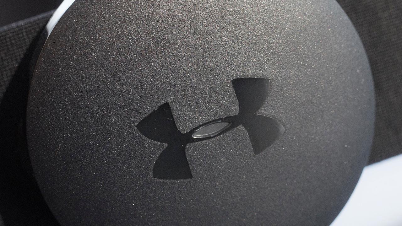 Under Armour cutting jobs; Nike sales up