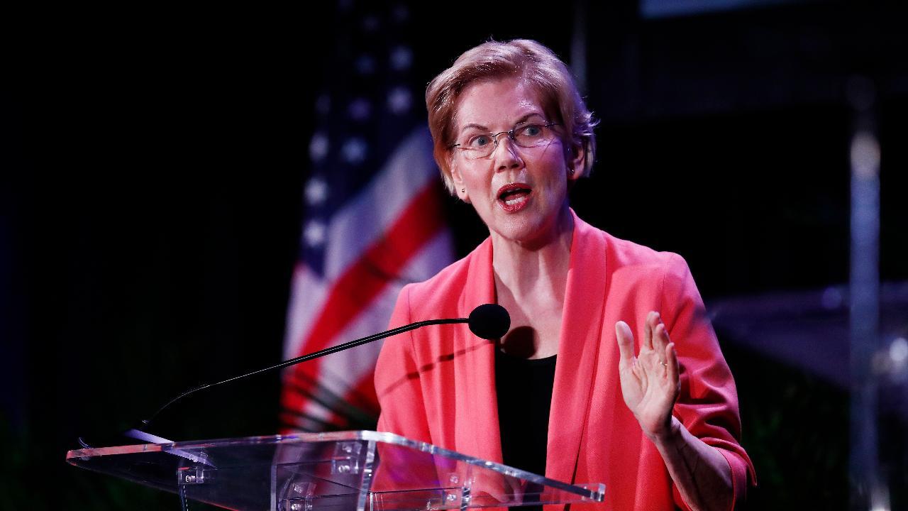 Elizabeth Warren: I’m with Bernie on Medicare-for-all