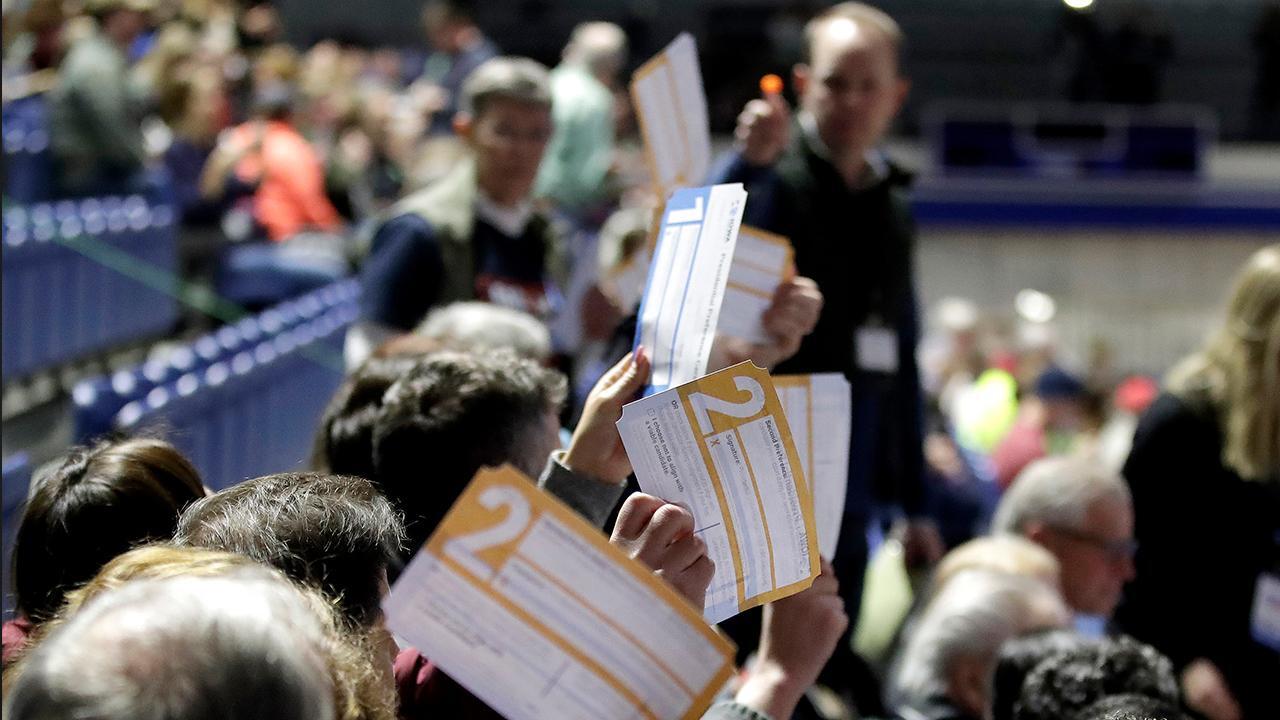 What is delaying the Iowa caucus results