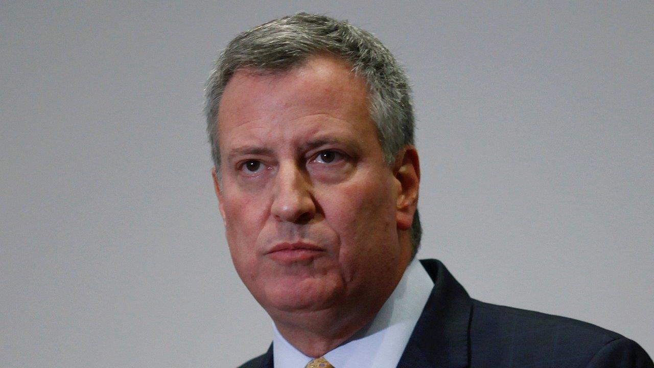 NYC Mayor Bill de Blasio skips NYPD swearing-in ceremony to join protests