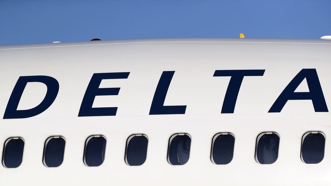 Woman boards Delta flight without ticket, proper identification