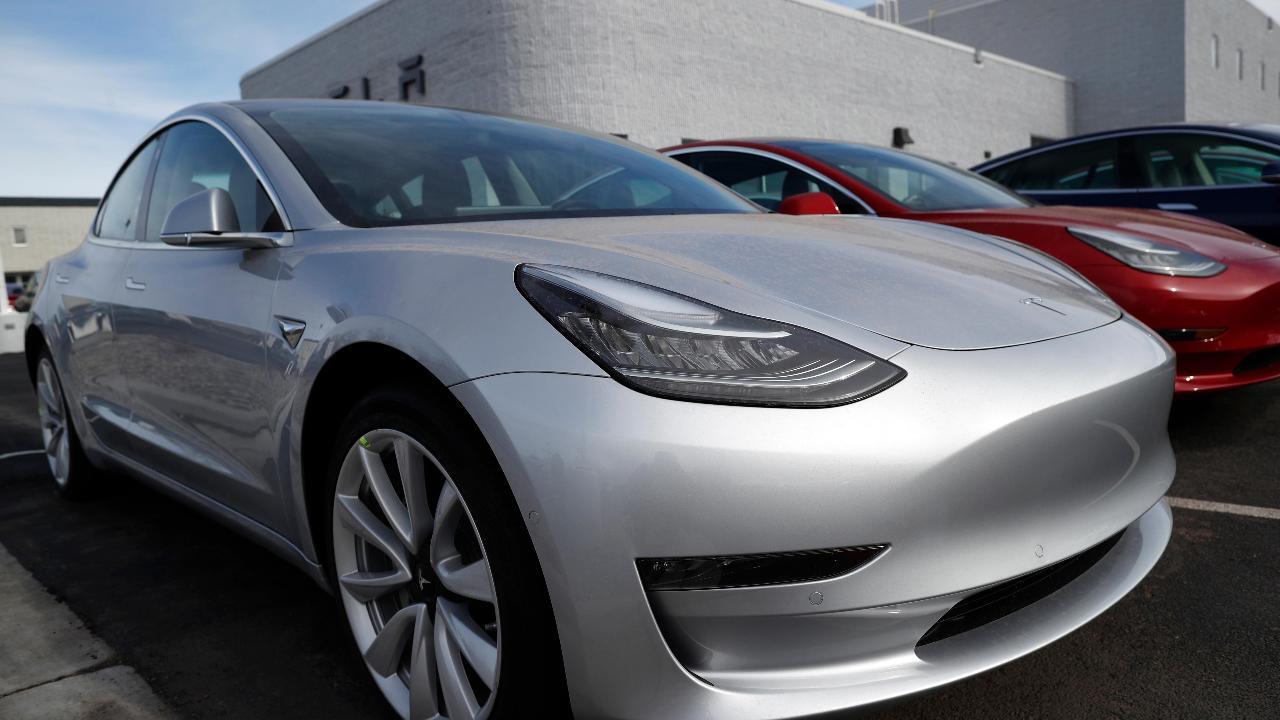 Tesla hits Model 3 production target