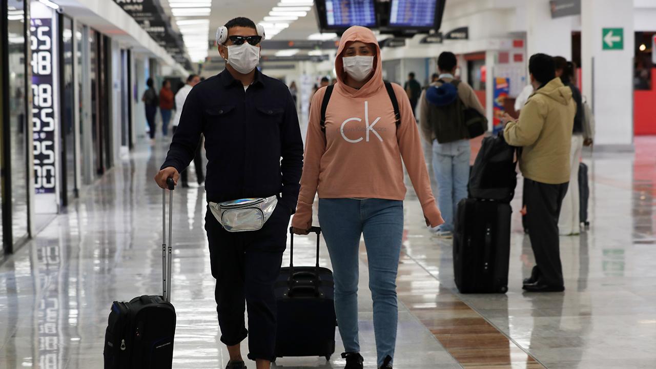 Coronavirus screenings spark airport chaos 