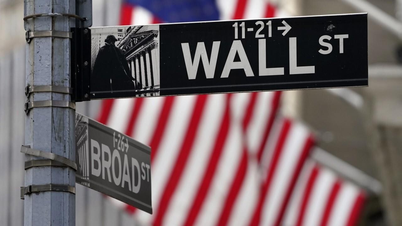 Stocks open higher as investors await Fed decision