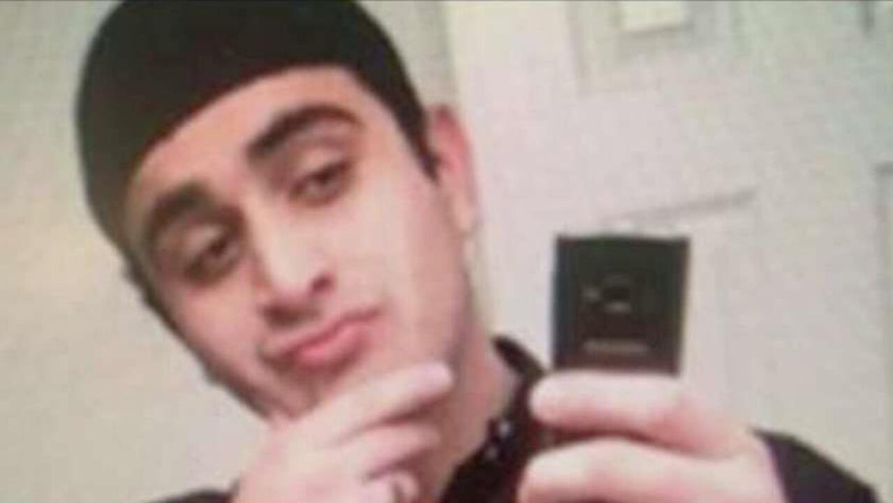 How was the Orlando shooter able to buy two guns?