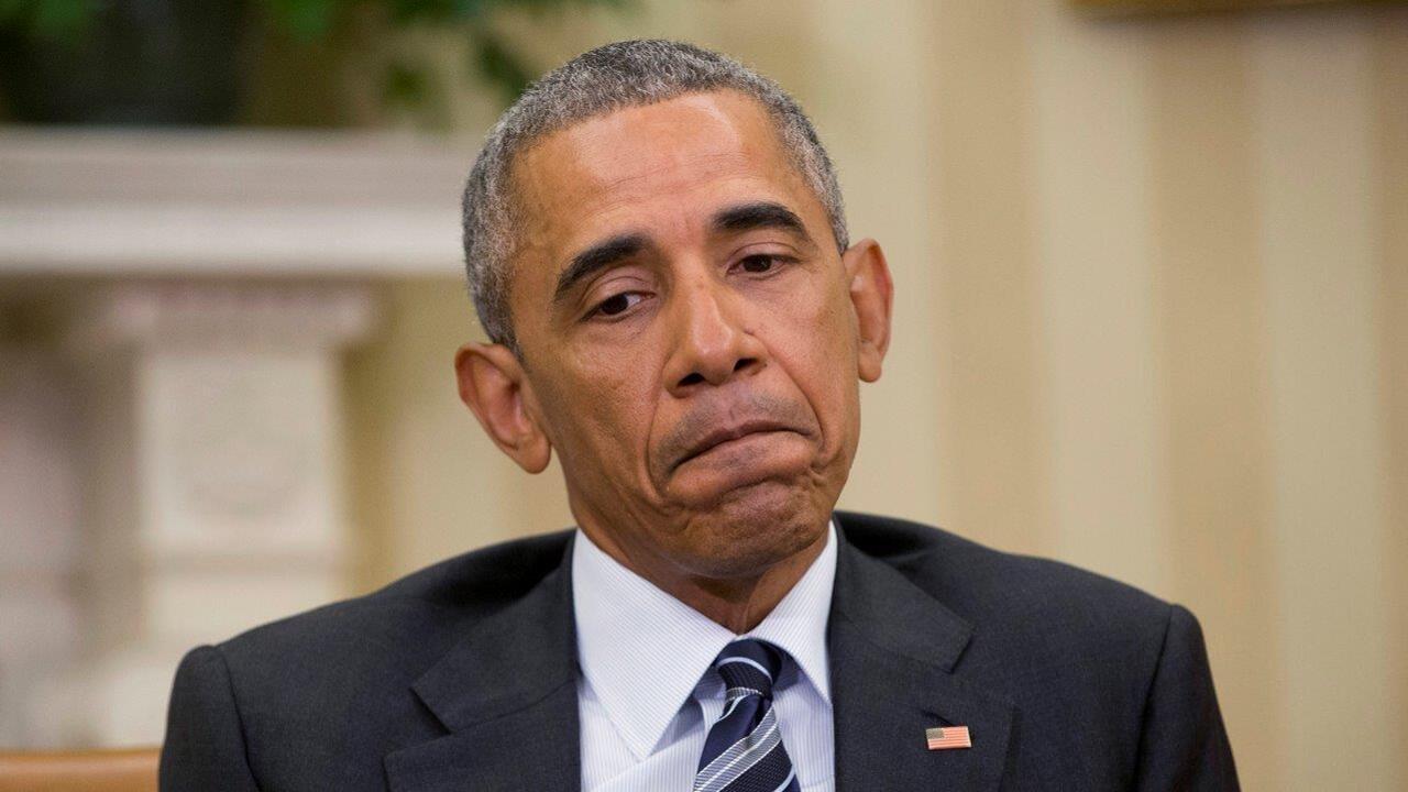 Obama downplaying cash payment to Iran?