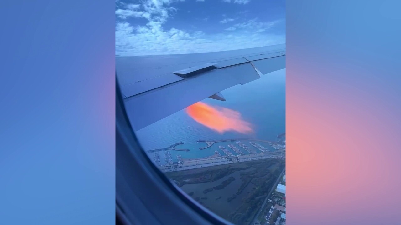 Video shows flames spewing from engine of Hainan Airlines plane following bird strike after departing Rome, Italy. (Credit: Viral Press)