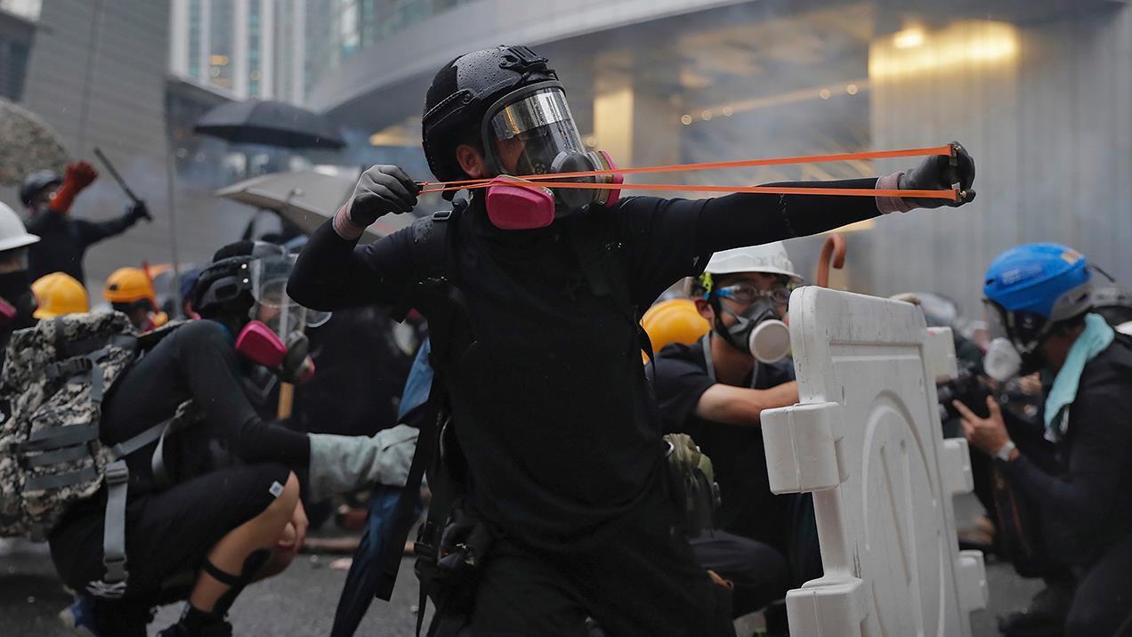 China issues a dire warning to Hong Kong protesters