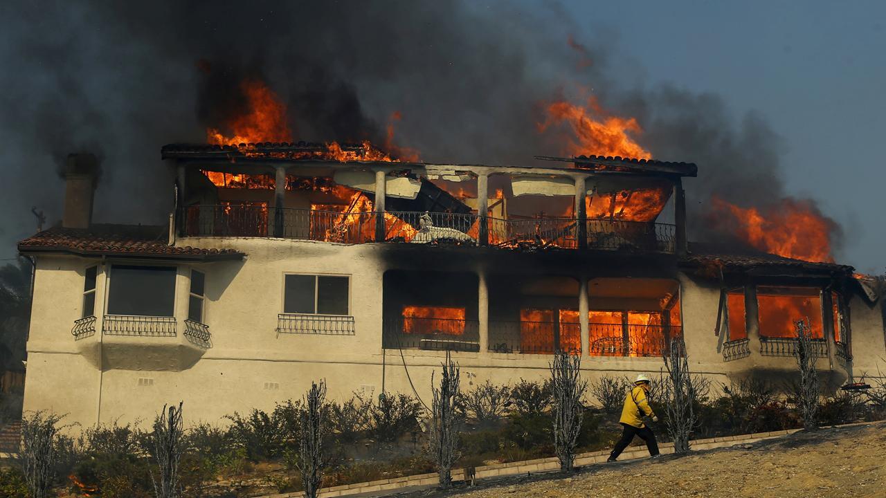 Wildfires blaze through Los Angeles area