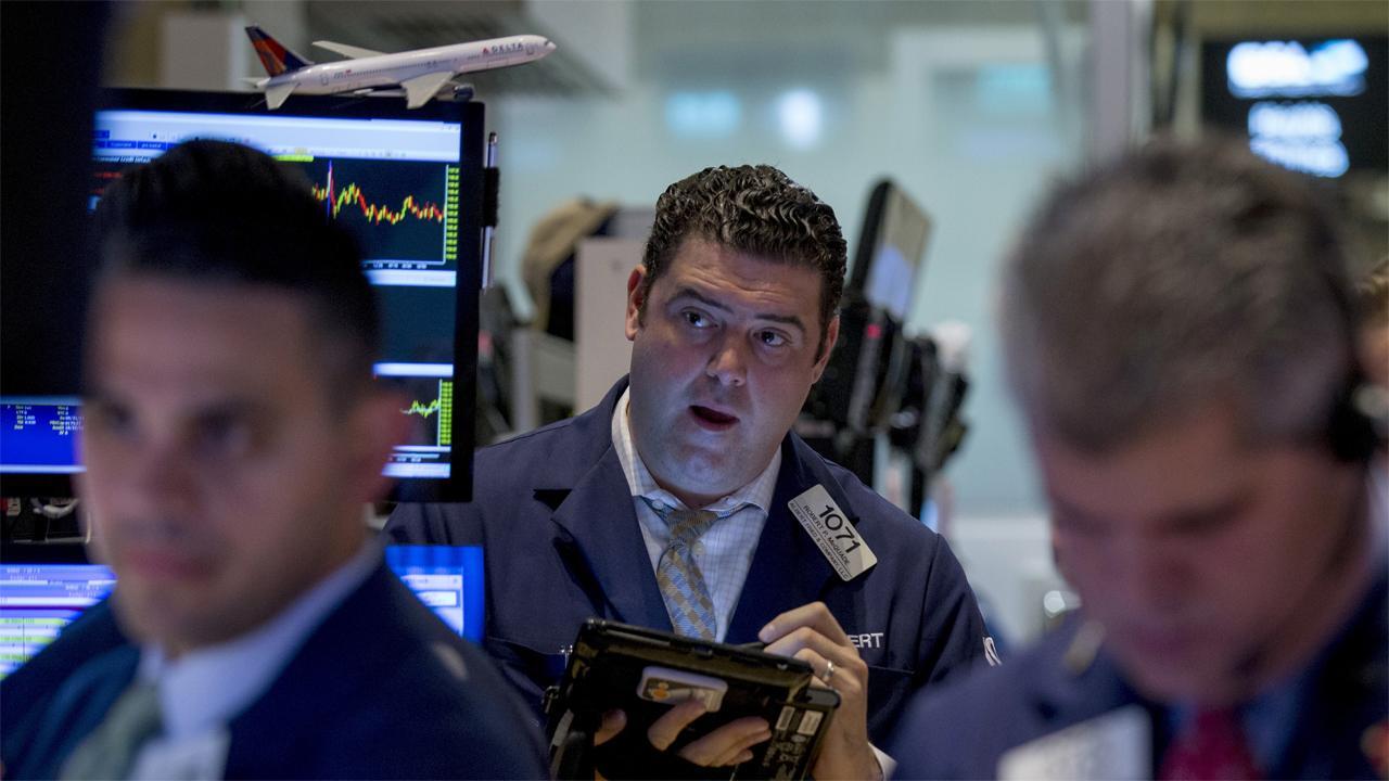 Stocks climb to highs amid merger talk