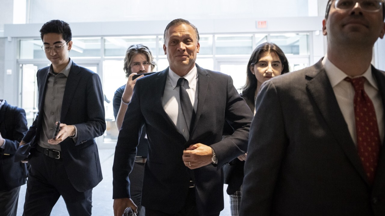 Devon Archer stays silent to reporters while arriving for House testimony