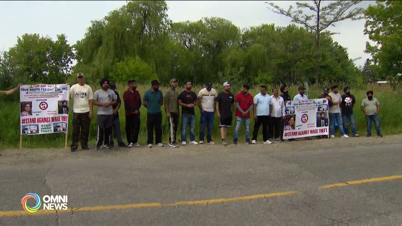 Workers and truck drivers protest, demanding alleged unpaid wages