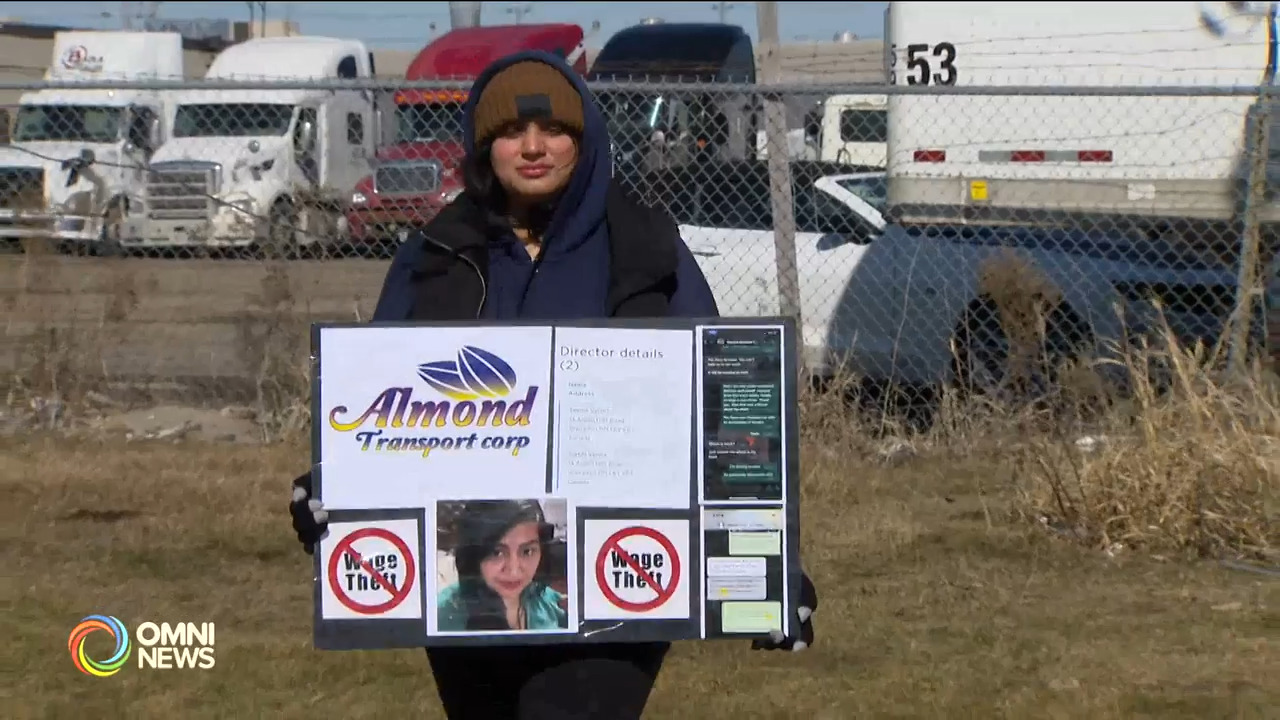 Women trucker protests against her former employer